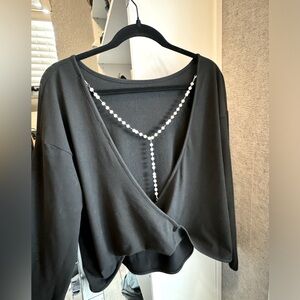 SEXY Black top with pearl detailing on back line Size XS